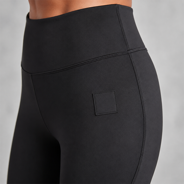 Custom logo placement on flare pants